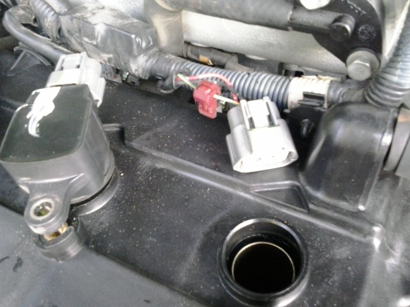 Illustration for article titled Altima Misfire, Oil in Spark Plug Wells